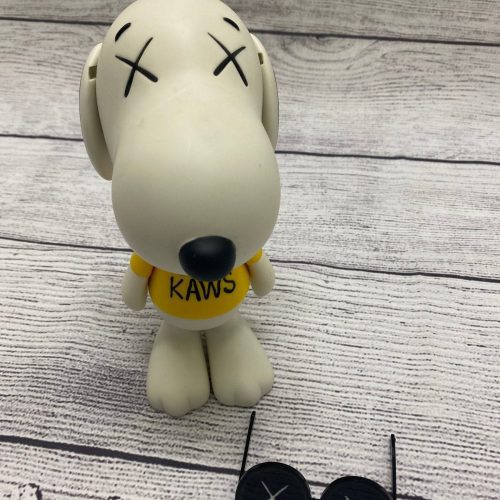 kaws x peanuts joe snoopy vinyl figure white displayed 292936