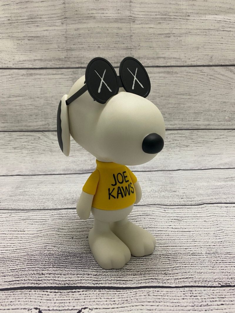 kaws x peanuts joe snoopy vinyl figure white displayed 653586